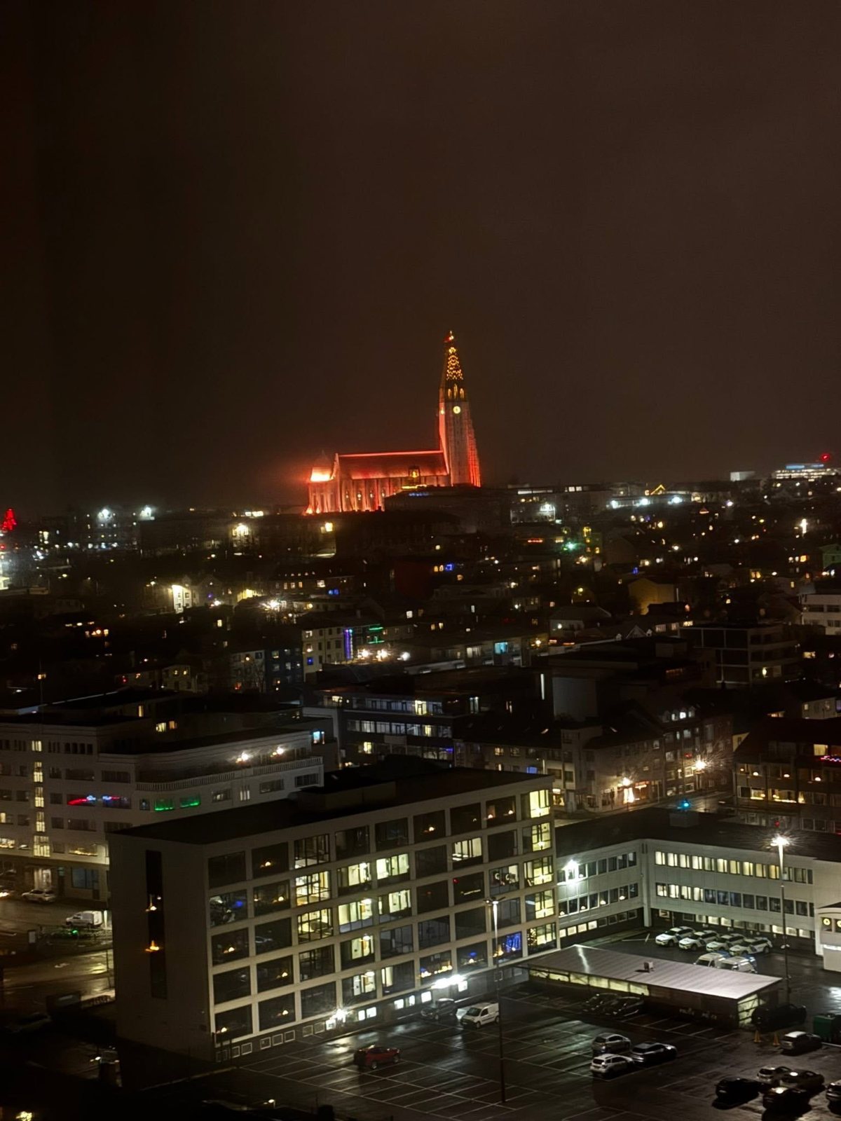 Reykjavik at night, Hallgrímskirkja lit in the distance