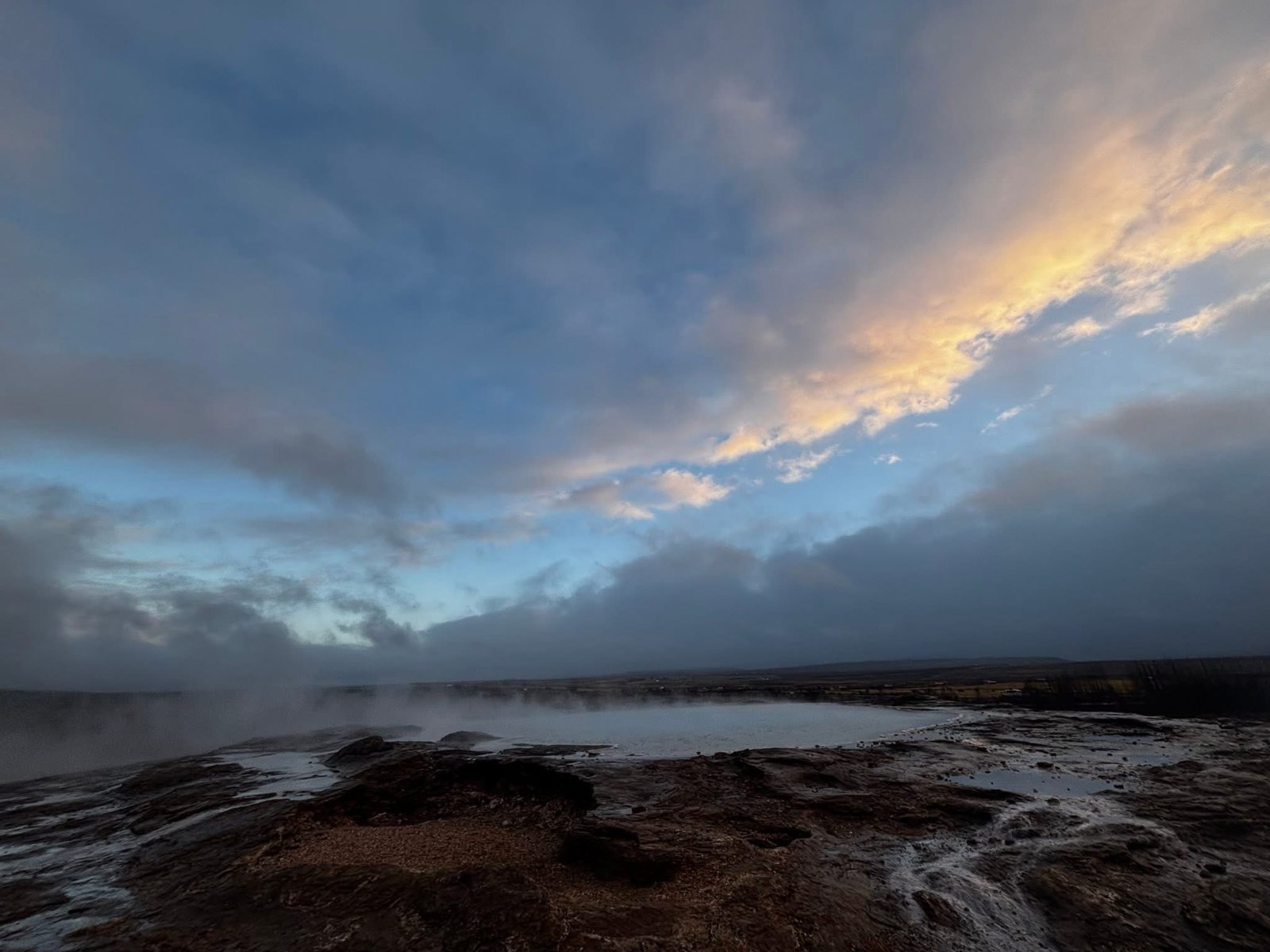 The Geysir geothermal field at dusk